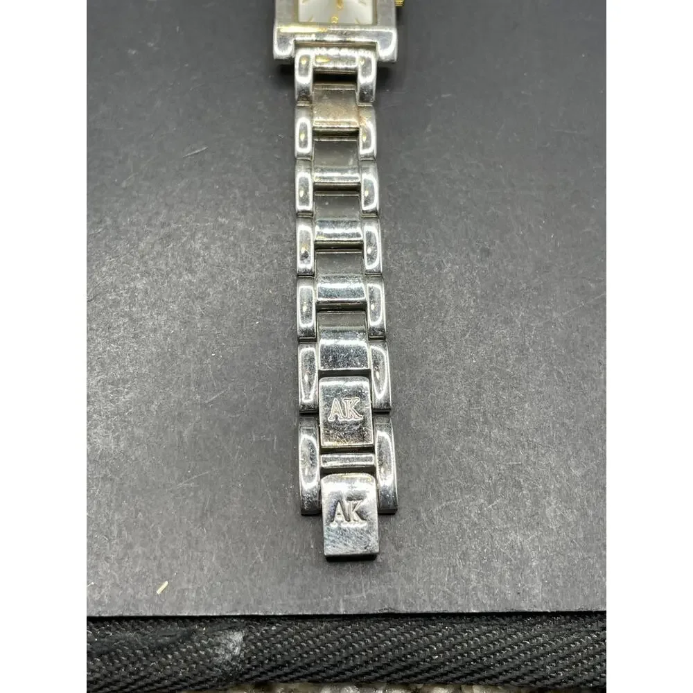 Anne Klein Women's 10/1409 Silver Dial Gold Accented Quartz Watch 21.5mm 6.5